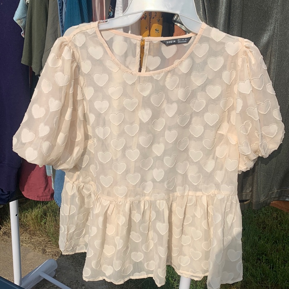 Peplum top, with hearts.